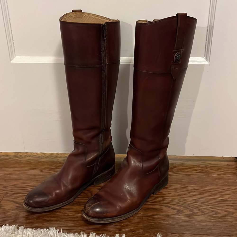 Frye riding boots.